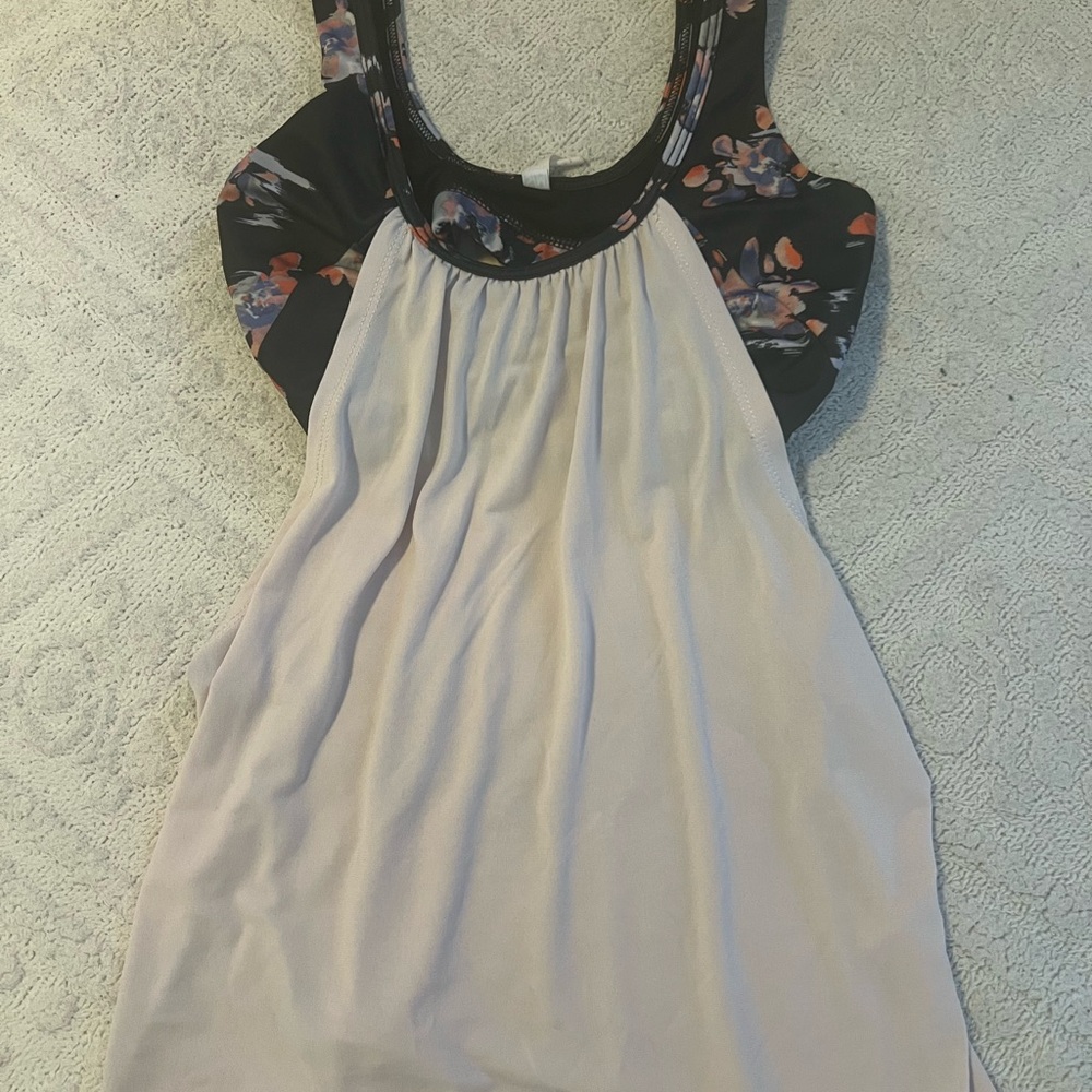Free People Movement “tankini” top with a floral bikini top inside